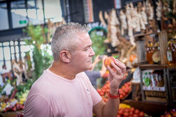 Neil has learnt to take time to stop and smell the peaches.