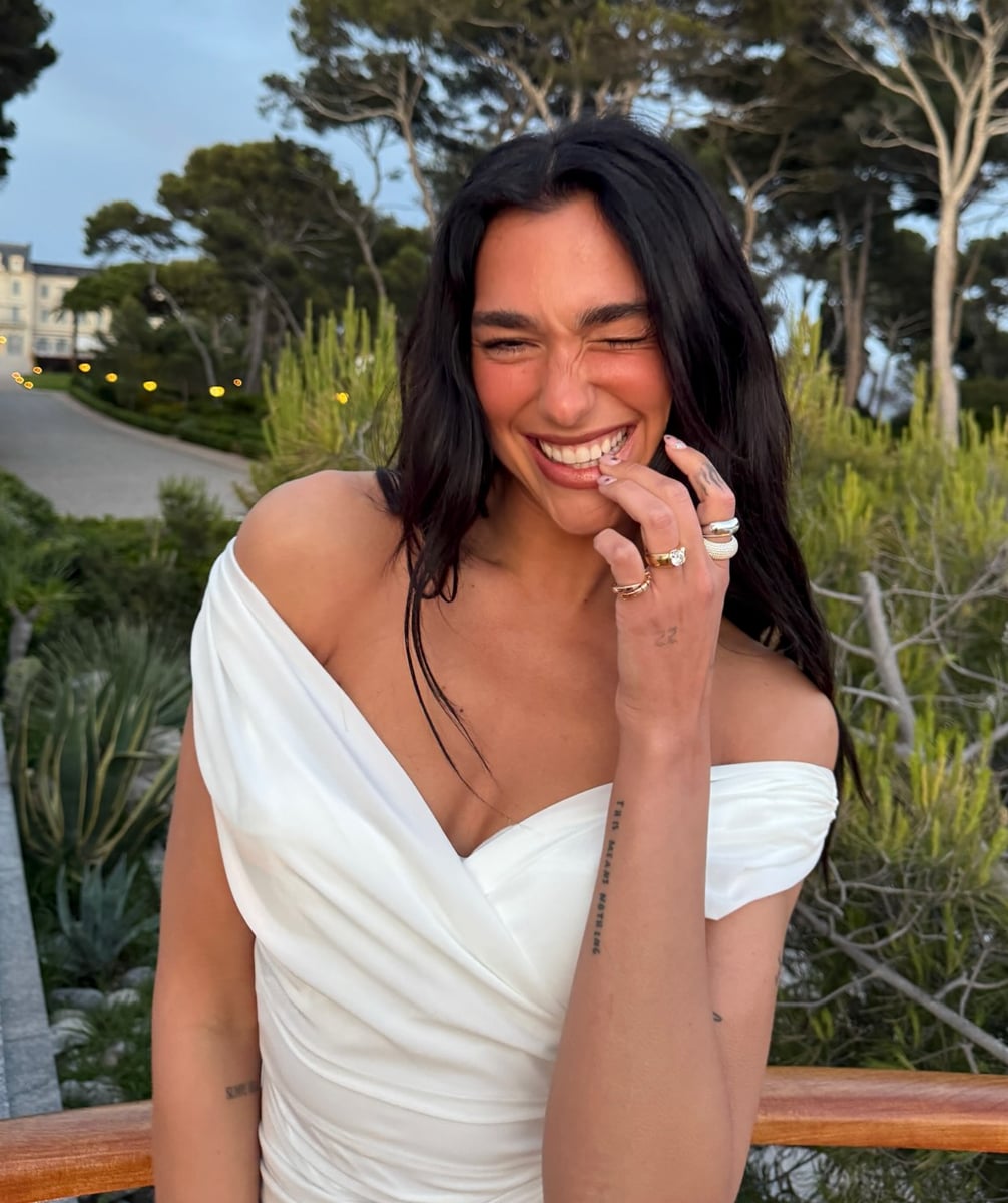 Dua Lipa poses in white bridal dress amid engagement to Callum Turner