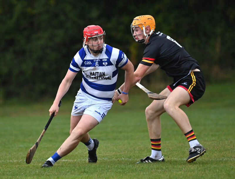  Liam Fitzgerald, St Colman's, looking to tackle his opposite number Jack Shine of Inniscarra. Picture: Dan Linehan