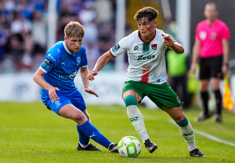 Matthew Murray of Cork City gets away from Kyle White, Waterford. Picture: ©INPHO/James Lawlor