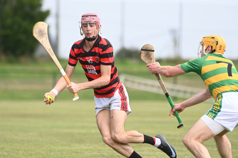  Conor Cahill with possession for Cloyne against SEamus Corry, Ballymartle in the Co-Op Superstores Premier Intermediate Hurling Championship; Cloyne vs Ballymartle at Cobh. Picture: Larry Cummins