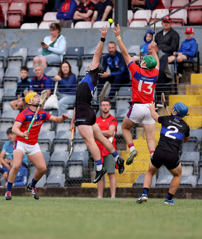 Bryan Murphy, Sarsfields, Conor Lenihan, Erins Own contest the high ball. Picture: Jim Coughlan.  Bryan Murphy, Sarsfields, Conor Lenihan, Erins Own contest the high ball. Picture: Jim Coughlan.