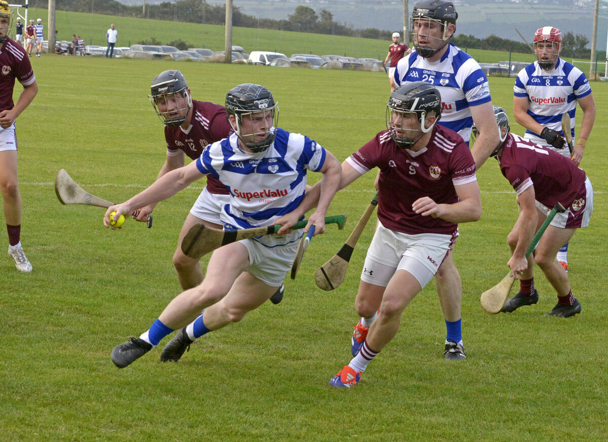 Inniscarra's Cormac Dineen breaks through. Picture: Denis Boyle