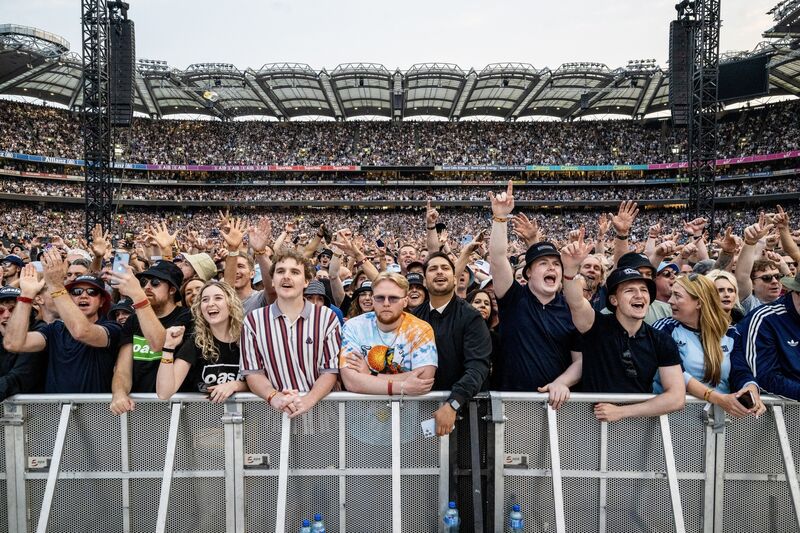 A crowd of 80,000 fans singing in unison at Croke Park in Dublin as Oasis returned for their Live ’25 reunion. Picture: Chani Anderson