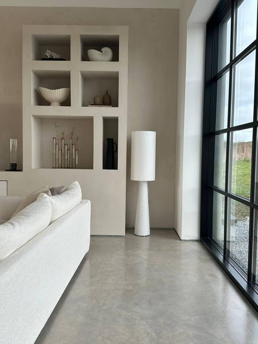 Large, floor-to-ceiling windows in Anna Bougharbel's home allow natural light to flood into the interior. Large, floor-to-ceiling windows in Anna Bougharbel's home allow natural light to flood into the interior.