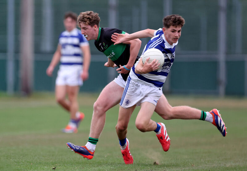  Cian Power, Nemo Rangers, tackles Gerard Murphy, Kinsale. Picture: Jim Coughlan.