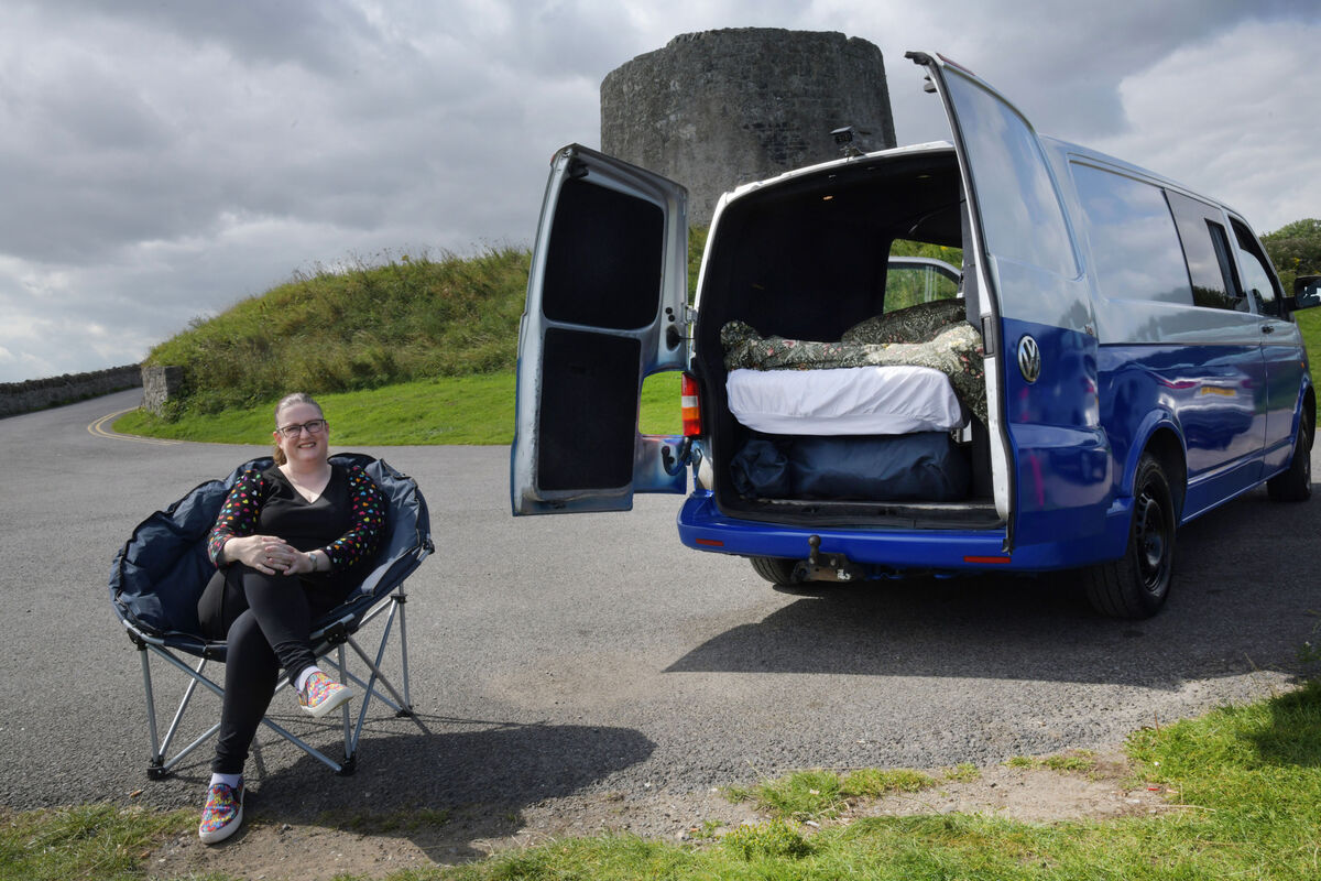 Caitriona Redmond with the camper van she and her family converted. Photograph Moya Nolan.