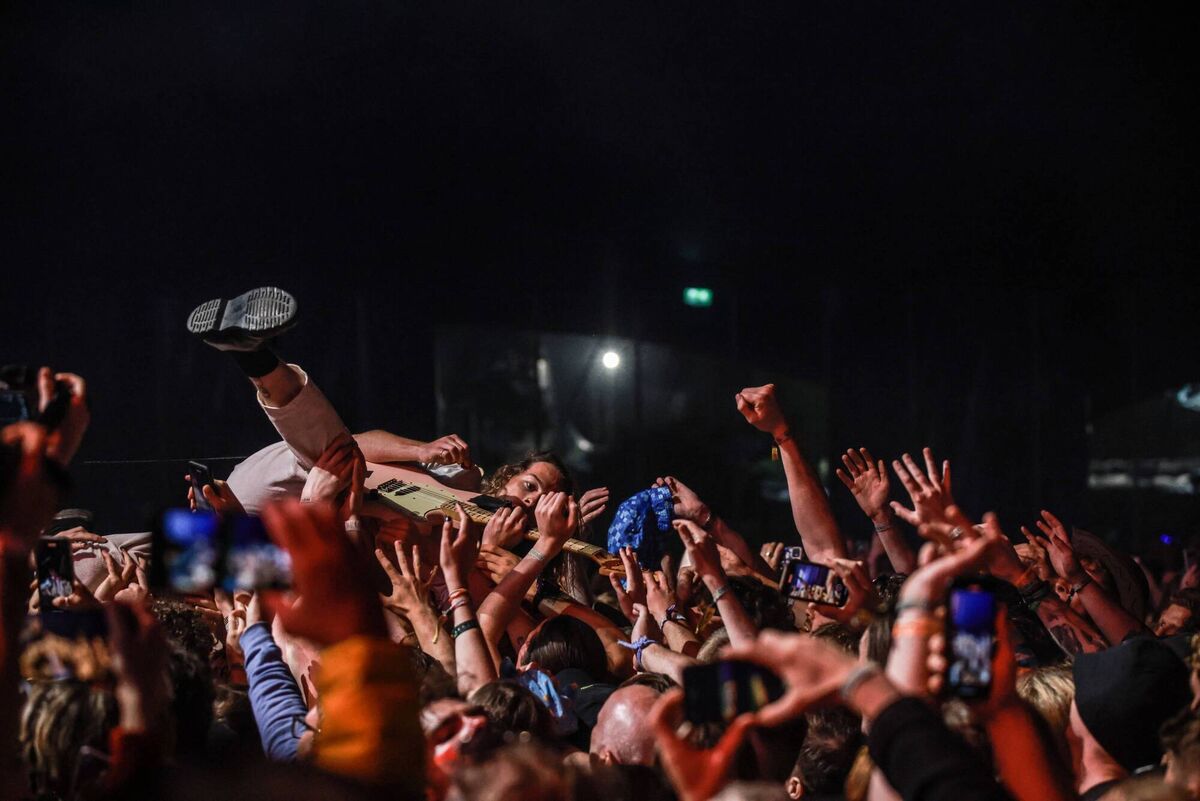 Lee Kiernan of IDLES crowdsurfing mid performance at Electric Picnic Festival 2023 at Stradbally Estate.