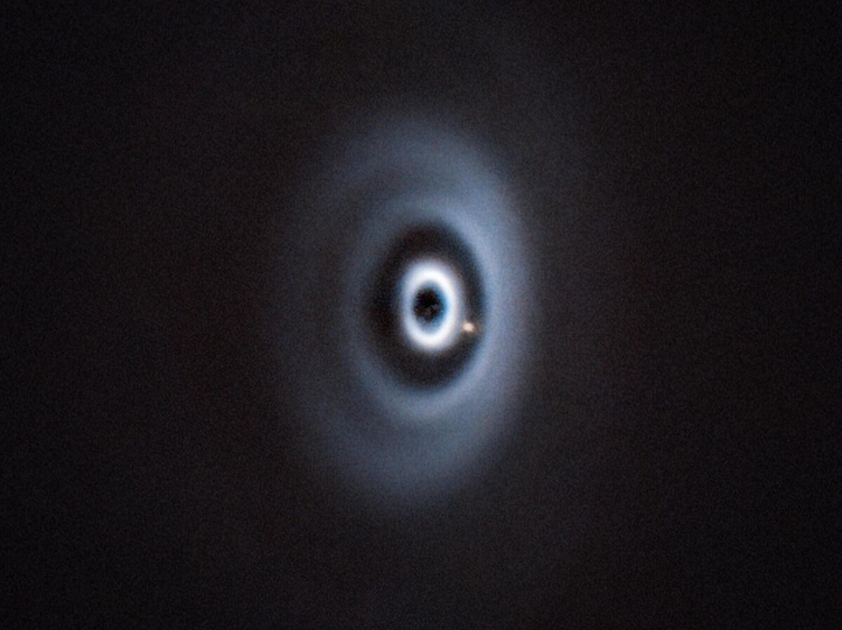 Undated handout photo issued by the University of Galway of a newborn planet eating its way through its dusty cradle as it orbits its host star. Picture: ESO/R. van Capelleveen et al/PA Wire