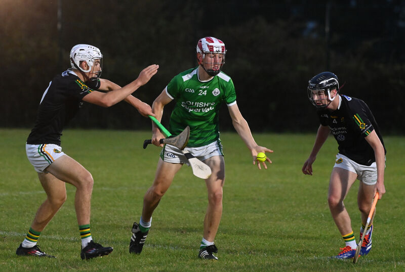 Éanna Hurney pops a pass for Ballincollig against Glen Rovers. Picture: Larry Cummins Éanna Hurney pops a pass for Ballincollig against Glen Rovers. Picture: Larry Cummins