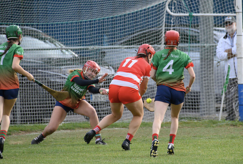  Ballinora keeper Tara O'Donoghue can not stop this shot on goal from Fiona Keating, Courcey Rovers. Picture Dan Linehan