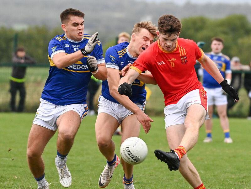 Mallow's Ben O'Shea crashes the ball to the Kilshannig net despite the efforts of Michael Murphy and Senan Harvey during their Avondhu U21 A Football Championship final at Glantane. Picture: David Keane  Mallow's Ben O'Shea crashes the ball to the Kilshannig net despite the efforts of Michael Murphy and Senan Harvey during their Avondhu U21 A Football Championship final at Glantane. Picture: David Keane