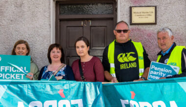 Striking school secretaries and caretakers hold protest outside Taoiseach’s Cork office