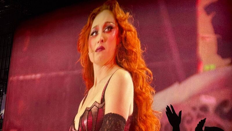Chappell Roan is jumping around the stage, her clandestine opening outfit getting stripped to less, less, less.