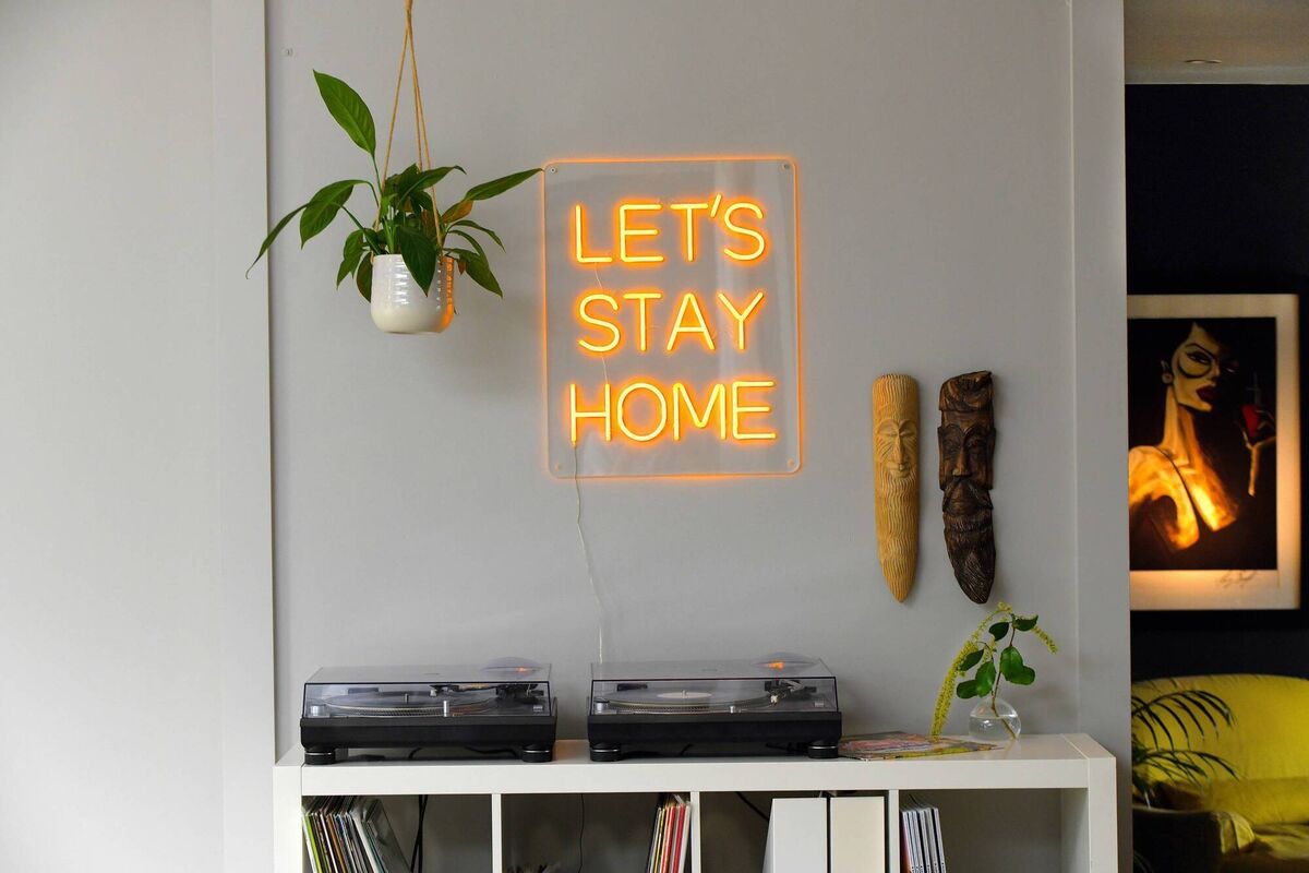 Record decks and vinyl in the open-plan living zone of Dee's home. Record decks and vinyl in the open-plan living zone of Dee's home.