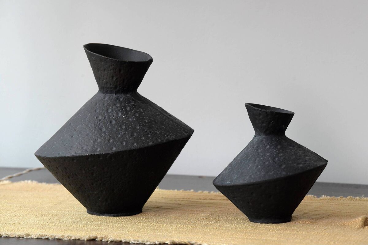 Sitting pretty: Ornamental pots on a sideboard. Sitting pretty: Ornamental pots on a sideboard.