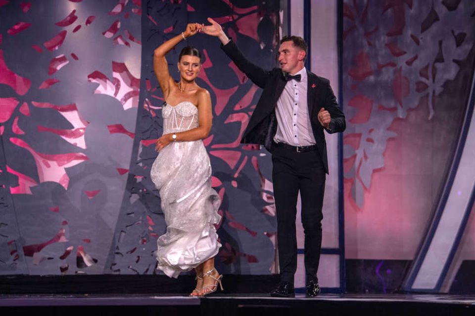 Meath escort Tommy Meade jiving on stage with Laois Rose Katelyn Cummins. Photo: Domnick Walsh