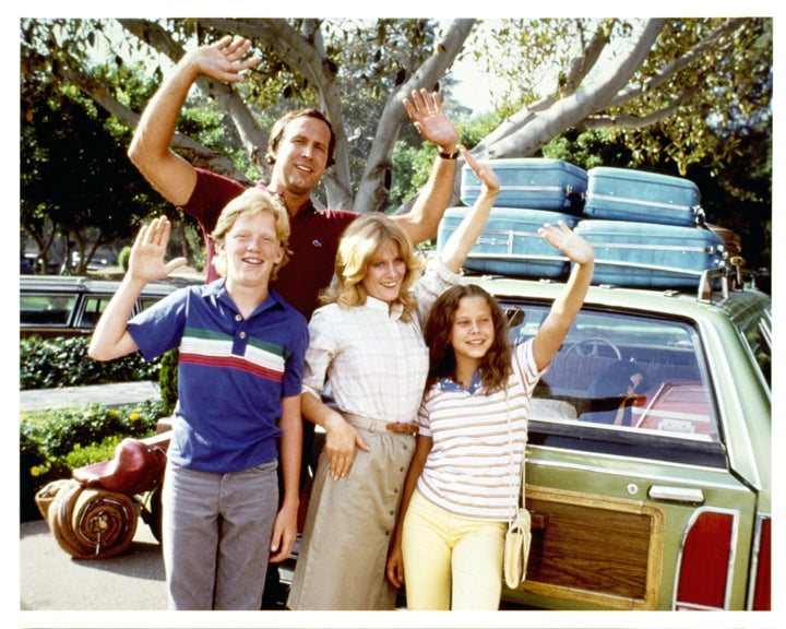 Anthony Michael Hall, Chevy Chase, Beverly D'Angelo and Dana Barron wave in a scene from the film “National Lampoon's Vacation” in 1983.