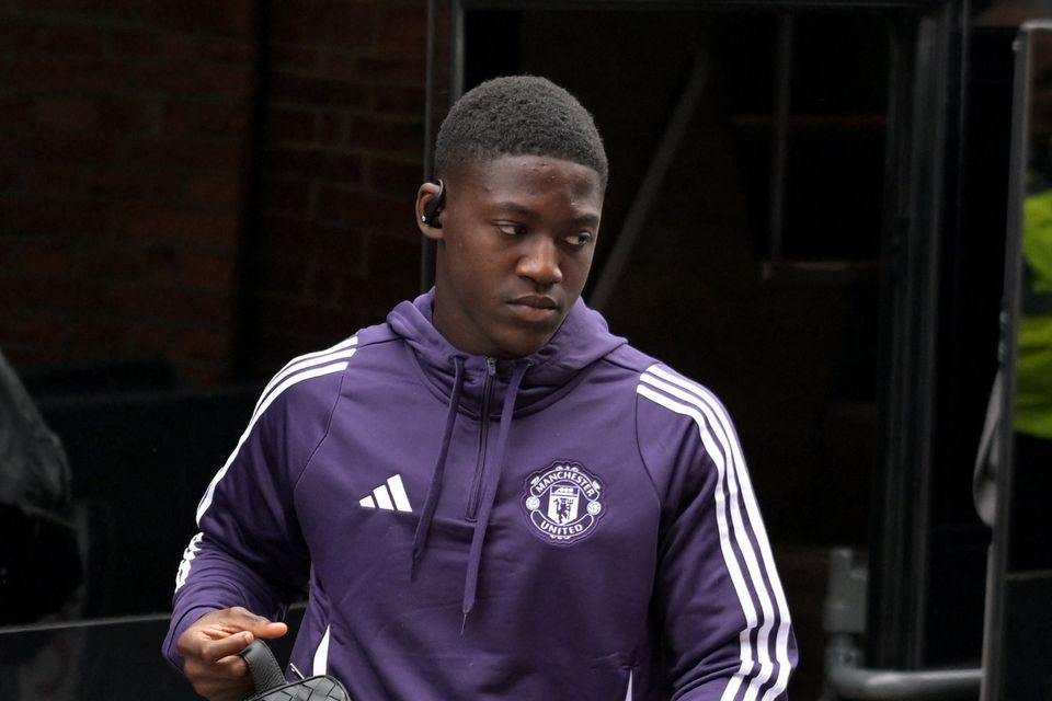 Manchester United's Kobbie Mainoo arrives at Craven Cottage last Sunday where he sat on the bench.