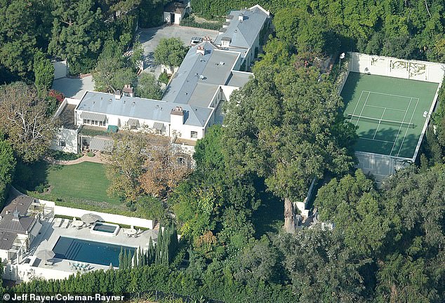 The posh pad boasting seven bedrooms, 10 bathrooms, a swimming pool, and a private tennis court, and measures a whopping 10,982 square feet