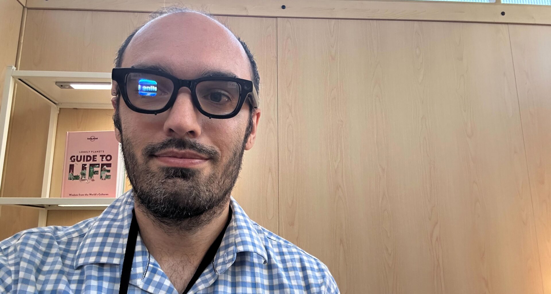 Michael Hicks wearing Android XR prototype glasses