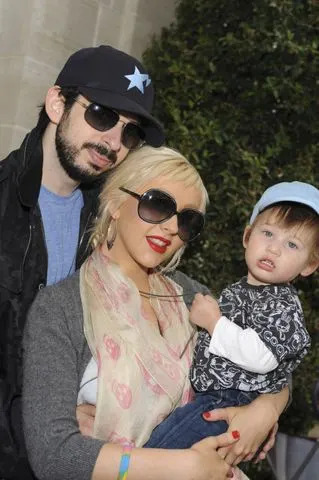 Getty Images Jordan Bratman and Christina Aguliera with their son Max at the Kidstock Music and Arts Festival in 2009.