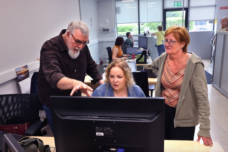 Conal O'Boyle, editor of The Nationalist, with reporters Marie Boran and Elizabeth Lee, at their office in Carlow town. Photograph: Dara Mac Dónaill 
