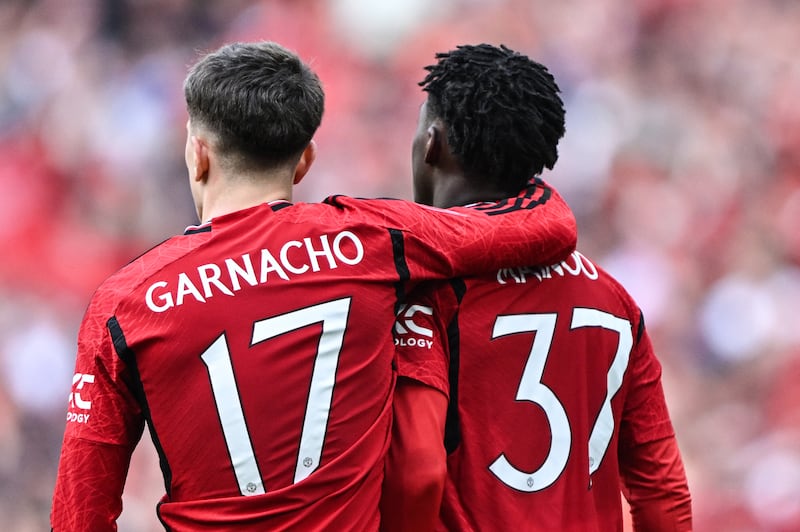 Manchester United's midfielder Kobbie Mainoo with Alejandro Garnacho. Photograph: Justin Tallis/AFP via Getty