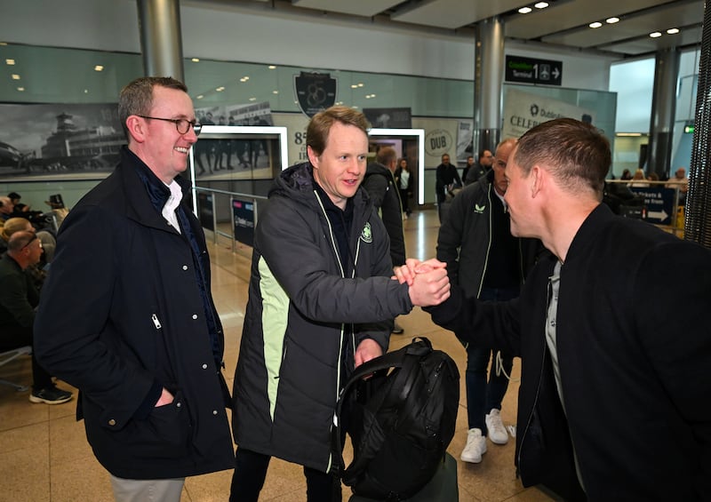Republic of Ireland under-17s coach Colin O'Brien (centre) is greeted by FAI CEO David Courell and FAI interim technical director Shane Robinson (right). Photograph: Stephen McCarthy/Sportsfile