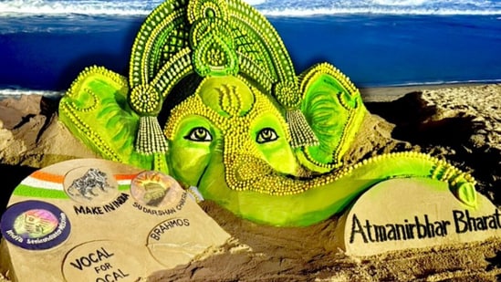 A sand artist from Odisha made a Lord Ganesh sculpture with the message of Atmanirbhar Bharat.(@sudarsansand/X)