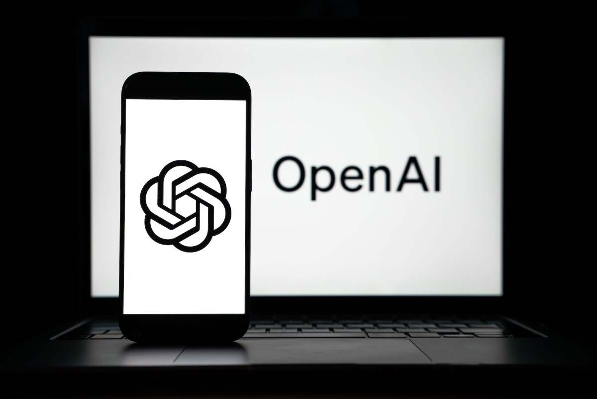 the logos of Open AI displayed on both computer and smart phone screen