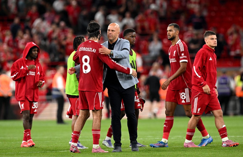 Arne Slot embraces Dominik Szoboszlai after Liverpool v Bournemouth in the Premier League