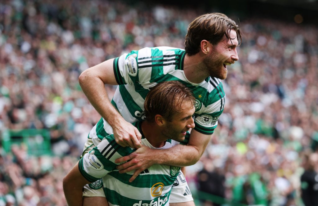 Benjamin Nygren of Celtic celebrates with team mate Anthony Ralston after he scores his second goal during the Premier League match between Celtic and Livingston at Celtic Park