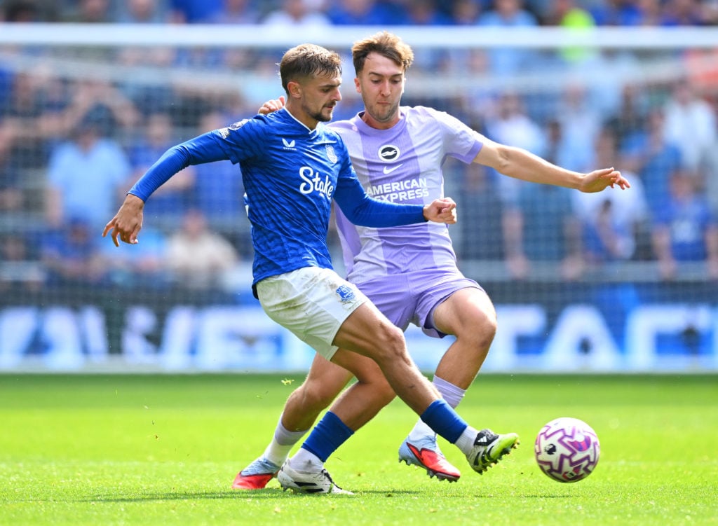 Kiernan Dewsbury-Hall of Everton battles for possession with Jack Hinshelwood of Brighton & Hove Albion during the Premier League match between Everton and Brighton & Hove Albion at Hill Dickinson Stadium.
