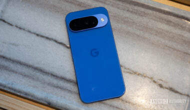 Google Pixel 10 in Indigo flat on marble table