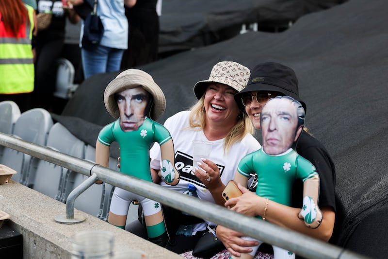 Come on you boys in green? Oasis fans emphasise the Gallagher brothers' Irish roots. Photograph: Dan Dennison