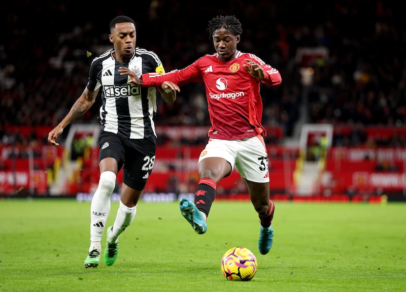 Manchester United's Kobbie Mainoo in action against Newcastle's Joe Willock. Photograph: Carl Recine/Getty Images