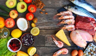 Healthy food of animal and vegetable origin on old wooden background.