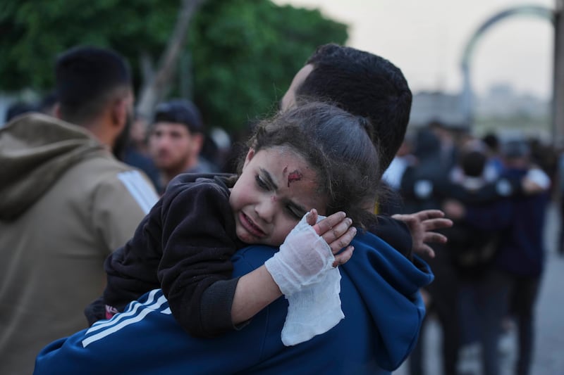 Children were among the injured after a strike in Gaza City (AP)