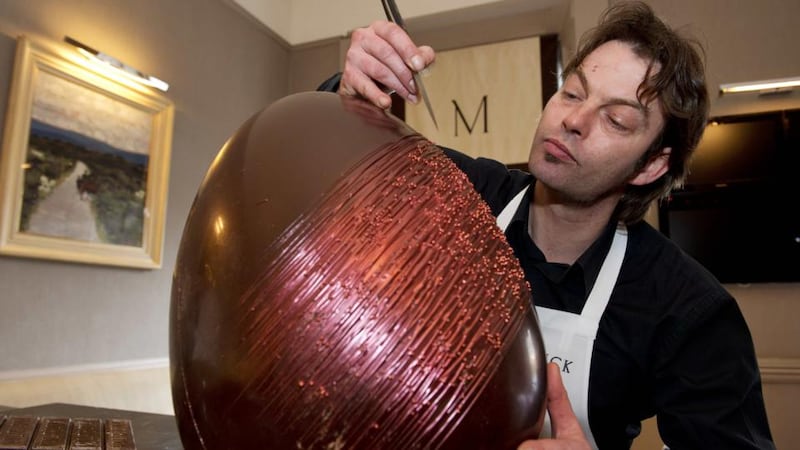 Chocolatier Benoit Lorge at work on a giant Easter egg. Photograph: Andrew Downes