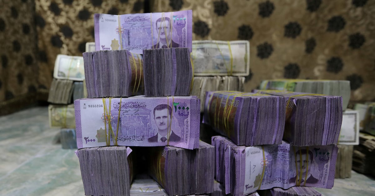 Syria to revalue pound and print new banknotes to boost economic recovery