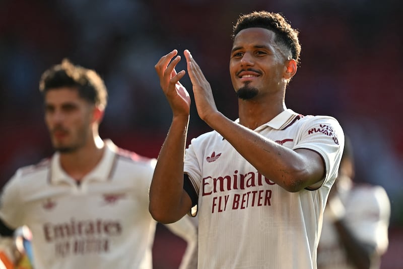 Arsenal's William Saliba applauds fans after the game. Photograph: Paul Ellis/AFP via Getty Images
