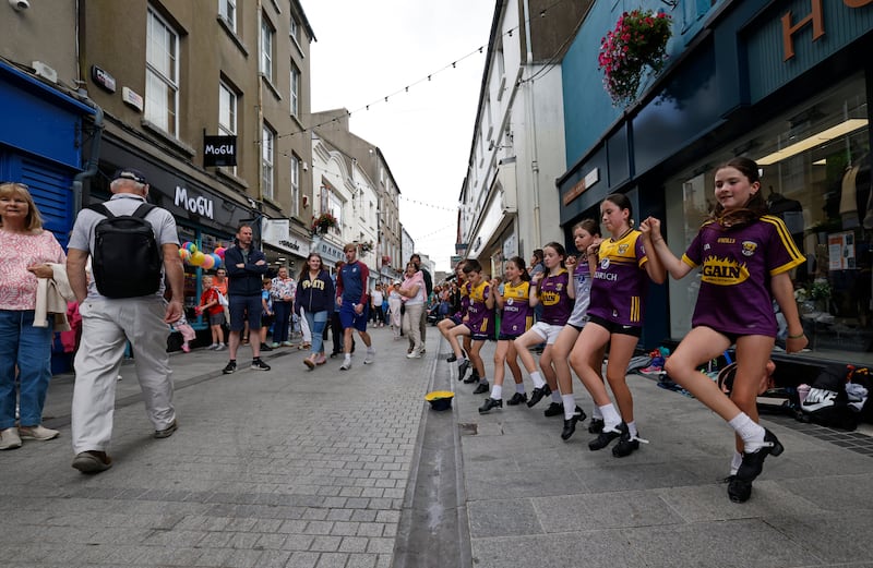 Members of the O'Donoghue dance school from Ballycanew, Co Wexford entertaining the crowds in Wexford town centre during Fleadh Cheoil na hÉireann. Photograph: Nick Bradshaw 

