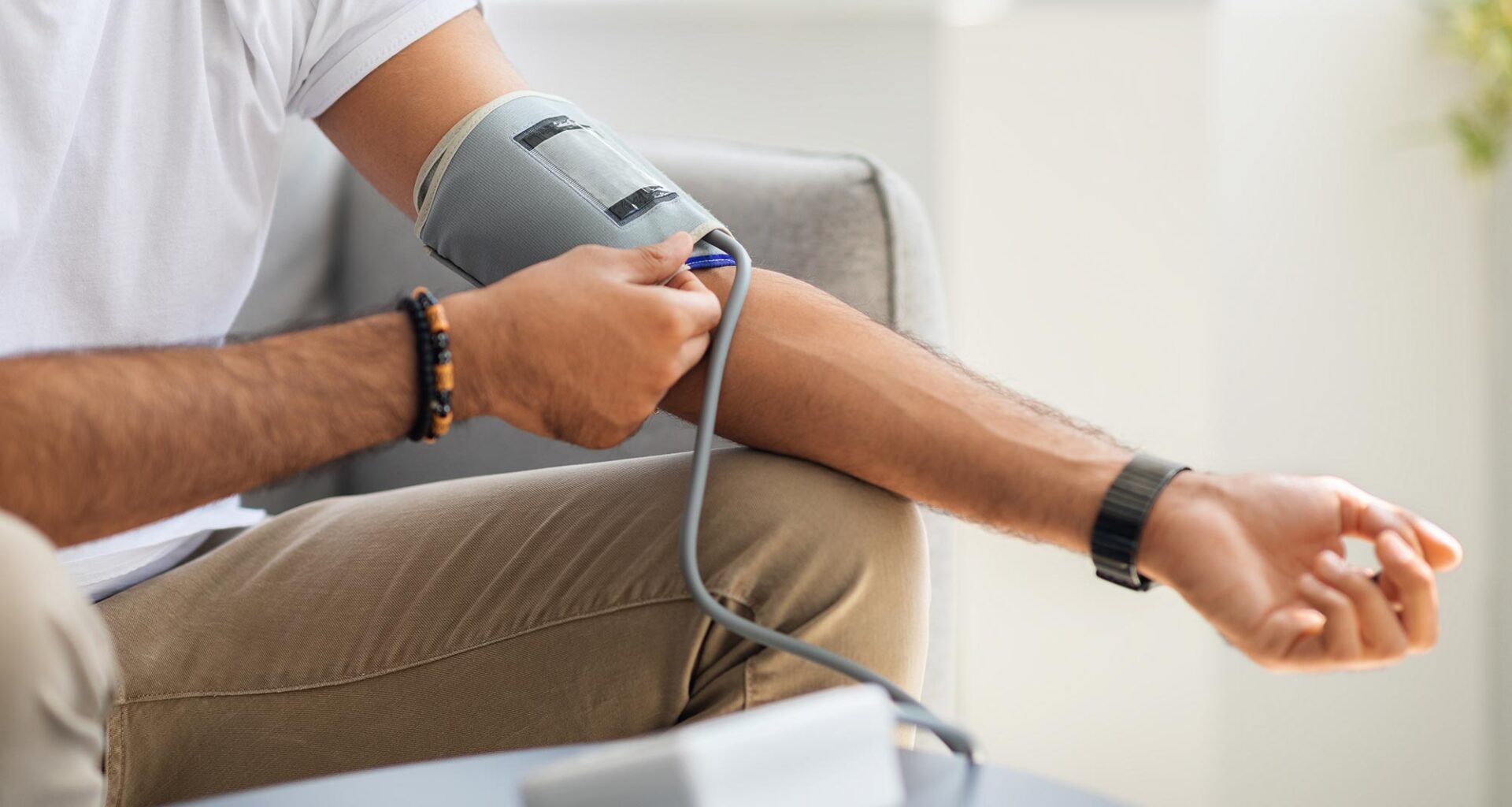 Male Patient Checking Blood Pressure