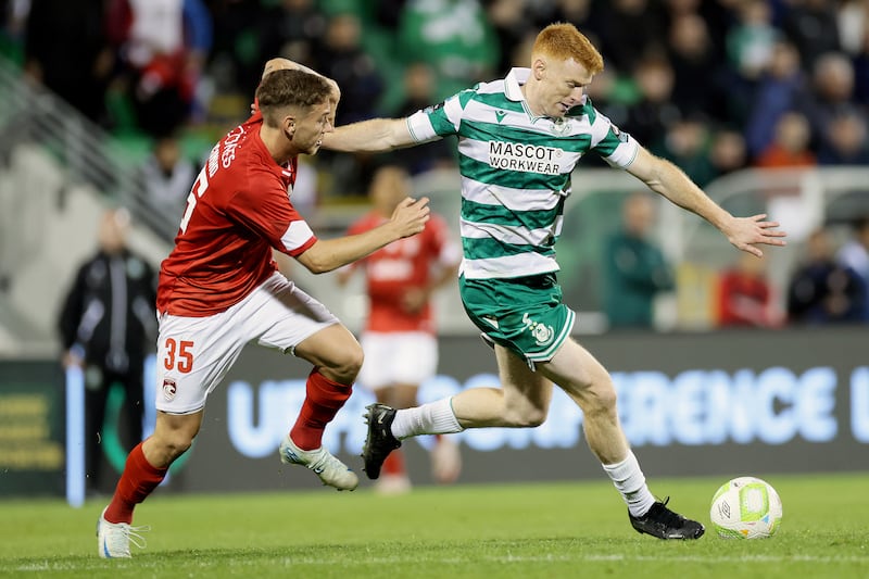 Shamrock Rovers' Rory Gaffney and Serginho of Santa Clara. Photograph: Laszlo Geczo/Inpho