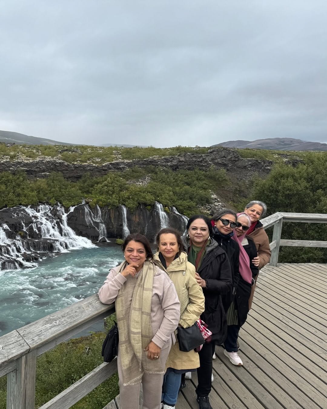 A picture-perfect moment captured at the breathtaking Hraunfossar waterfalls.   A picture-perfect moment captured at the breathtaking Hraunfossar waterfalls.