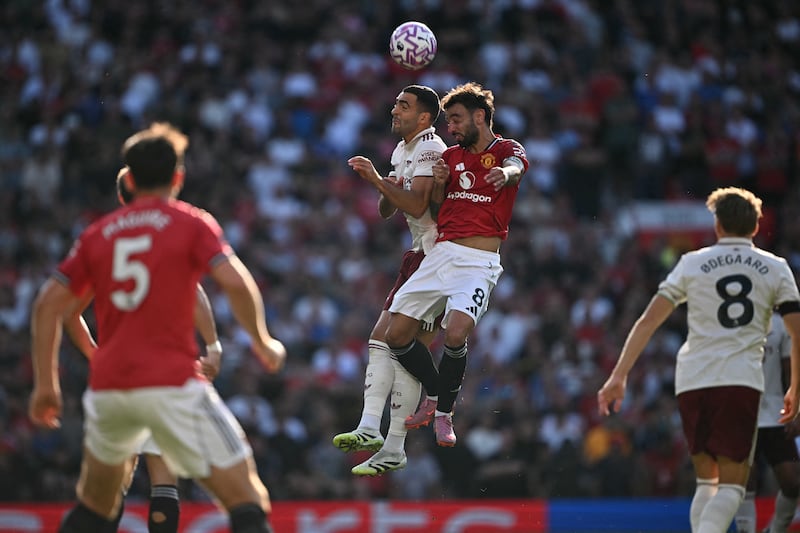 Arsenal's Mikel Merino and Manchester United's Bruno Fernandes compete in the air. Photograph: Paul Ellis/AFP via Getty Images