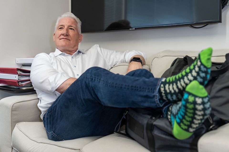 John King gives a nod to his Galway roots as he relaxes in his office in CNN in Washington. Photo: Benjamin Lowy