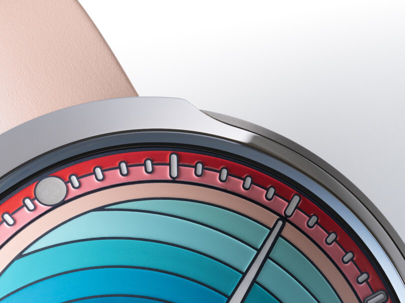 close up of A modern wristwatch with a pink band 