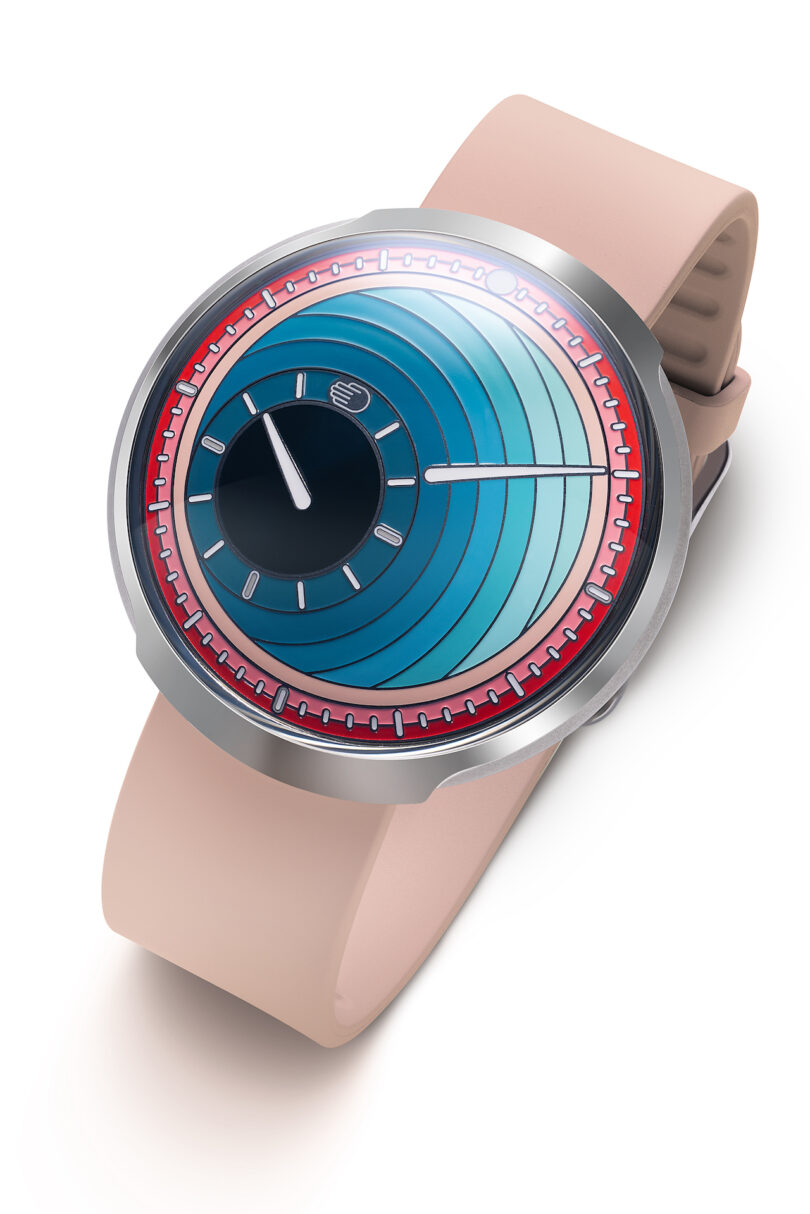 close up of A modern wristwatch with a pink band 